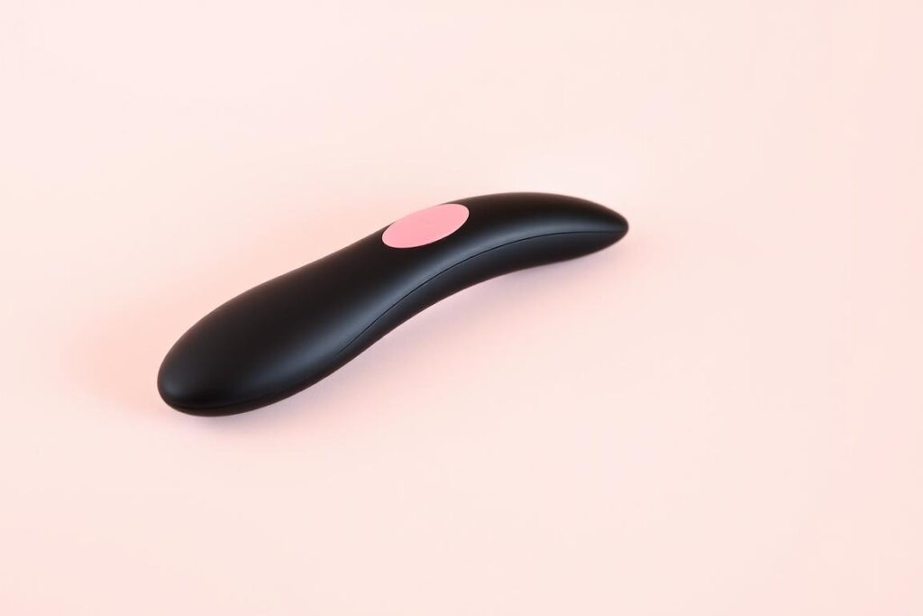 A G-spot vibrator showing its characteristic curved shape designed for internal stimulation A G-spot vibrator showing its characteristic curved shape designed for internal stimulation